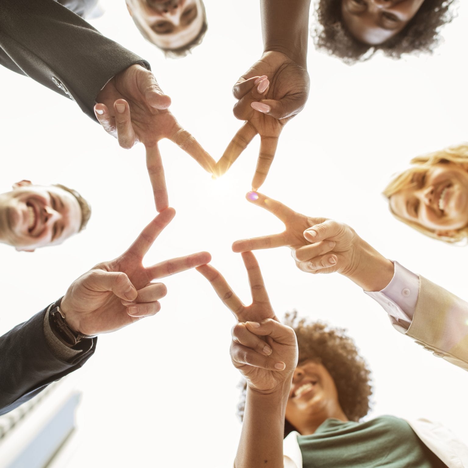 Successful business people making a star